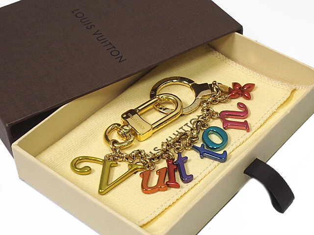 Shop Louis Vuitton Lv new wave bag charm and key holder by