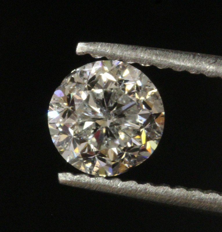 Clarity enhanced .71ct SI3 E loose round natural diamond 5.38x3.62mm earth mined