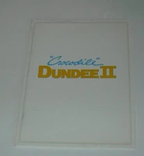 1988 CROCODILE DUNDEE II PROMO MOVIE PRESS KIT 2 PHOTOS PAUL HOGAN COMEDY