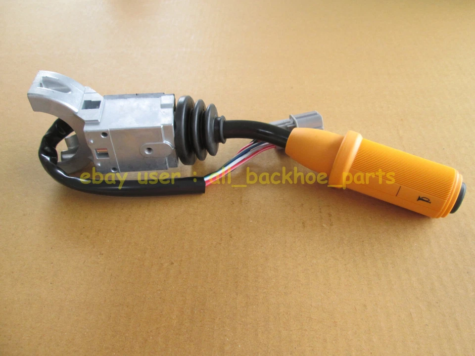 Retroexcavadora JCB - INTERRUPTOR DE COLUMNA DELANTERA Y TRASERA (N.º DE PIEZA) 701/52601) Foto 3 de 4