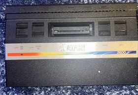 Atari 2600 With ace controller and power cables. POWERS ON