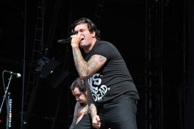 Jordan Pundik of American pop-punk band New Found Glory live on st - Old Photo 1