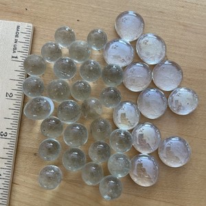 Clear Marbles And Domed Stones