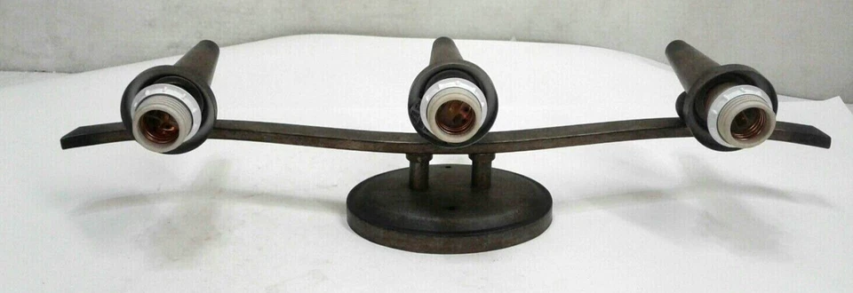 Antorcha de tocador Triarch 25602 Olympian de 3 luces bronce con vidrio Scavo tintado ámbar Foto 2 de 4