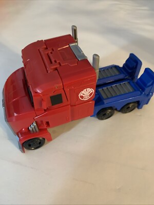 Transformers EarthSpark Spin Changer Optimus Prime Semi Truck