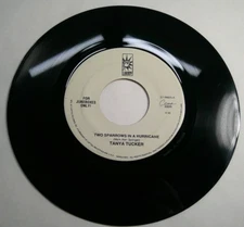 Tanya Tucker 45 RPM Record. Two Sparrows In A Hurricane / Danger Ahead. VG+