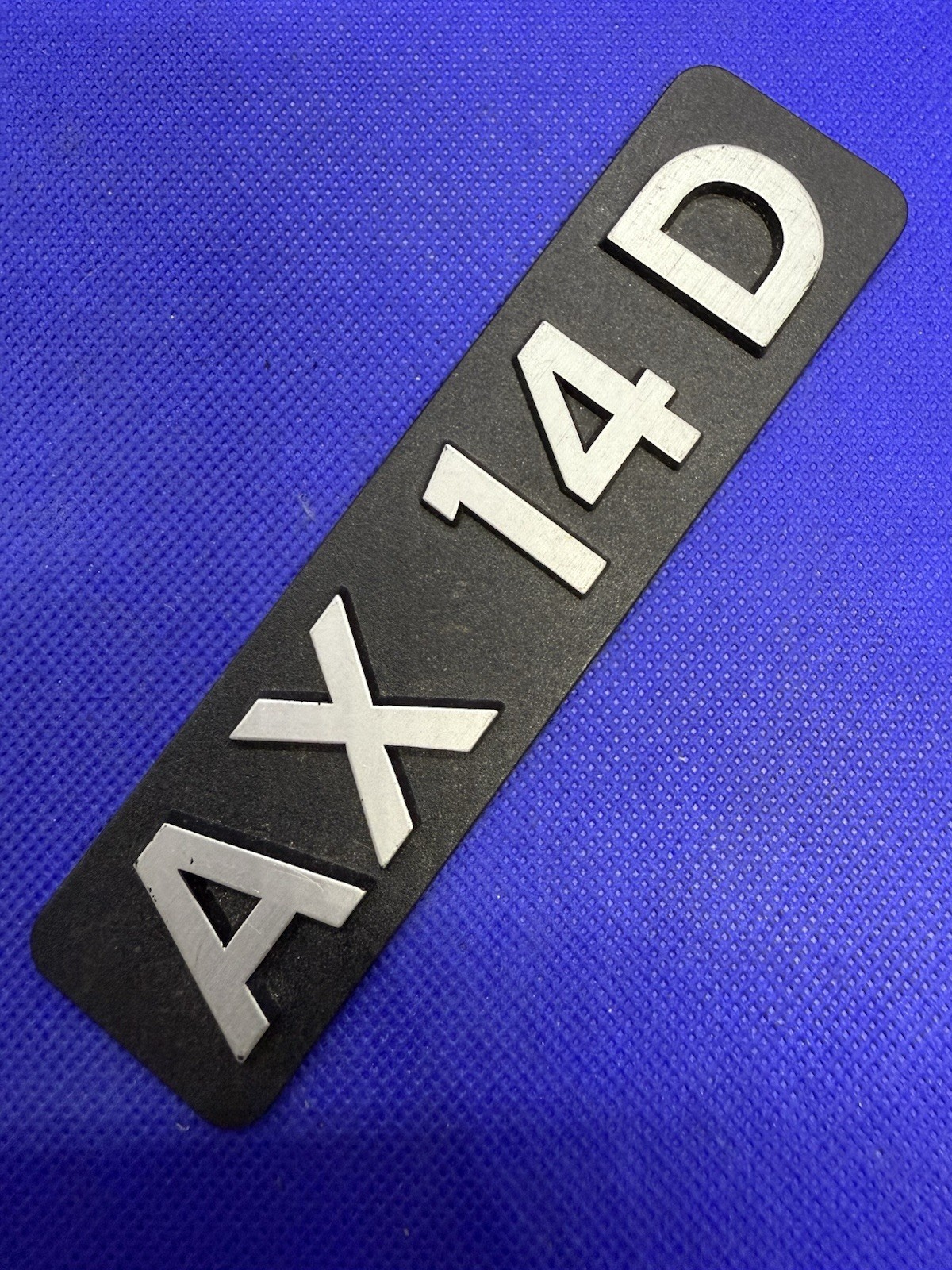 Badge arrière de remplacement Citroën AX 14D gris