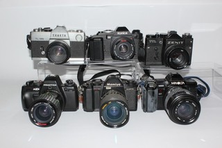 Assorted Vintage 35mm SLR Film Cameras w Some Manual Lenses Cases Job Lot