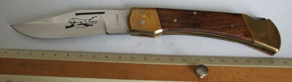 Couteau tigre de poche bois laiton & lame stainless en bel état - Photo 1/1