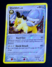 2007 Pokemon SHIELDON Black Star Promo COSMOS HOLO Bleed Error Card #DP08 SWIRL on eBay