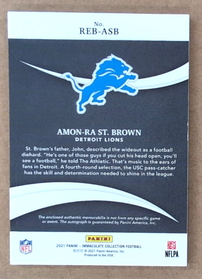 2021 Immaculate Collection Rookie Eye Black Auto Jerseys Amon-Ra St. Brown 88/99 view 2