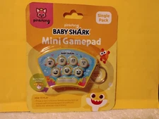 Baby Shark Mini Gamepad by Pinkfong Interactive Light-Up Toy 4 Levels of Play