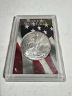 2009 American Silver Eagle containing 1 Troy Ounce of .999 Fine Silver.