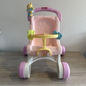 Fisher-Price Brilliant Basics Stroll Along Musical Doll Stroller Walker Push Toy