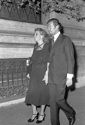 Roger Moore his wife Luisa Mattioli walking in the streets of Rome- Old Photo