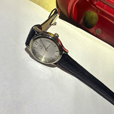 Bulova Dress Analog Wristwatch Silver Dial Black Leather Strap 16mm Silver