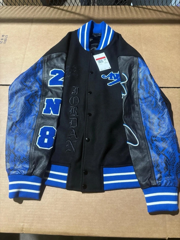 Chaqueta Universitaria Jordan X Awake NY Negra/Juego Real FQ5439-010 Para Hombre Talla L” Foto 2 de 4