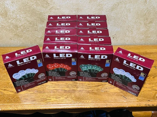10 BOXES OF ENCHANTED FOREST LED 70 SPHERE LIGHTS SET GREEN, RED, WHITE- ALL NEW