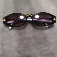 Occhiali da sole donna Christian Dior verde occhio di gatto lenti viola nuovi