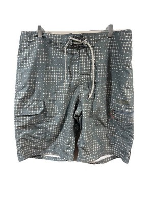 Simms fishing shorts featuring a grey and white geometric grid pattern Large