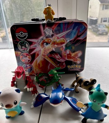 Lot Of  7 U Pokémon Figures, 2 Badges /Pins, & a Yu-Gi-Oh Game Case to hold them