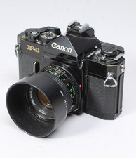 CANON F1 W 50MM F/1.8 FD LENS, HOOD, FLASH MOUNT  CAP SHUTTER GOOD METER IN-OP