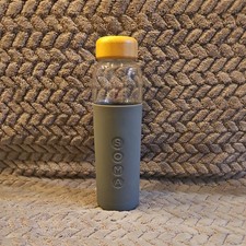 SOMA 17oz Glass Water Bottle with Gray Silicone Sleeve