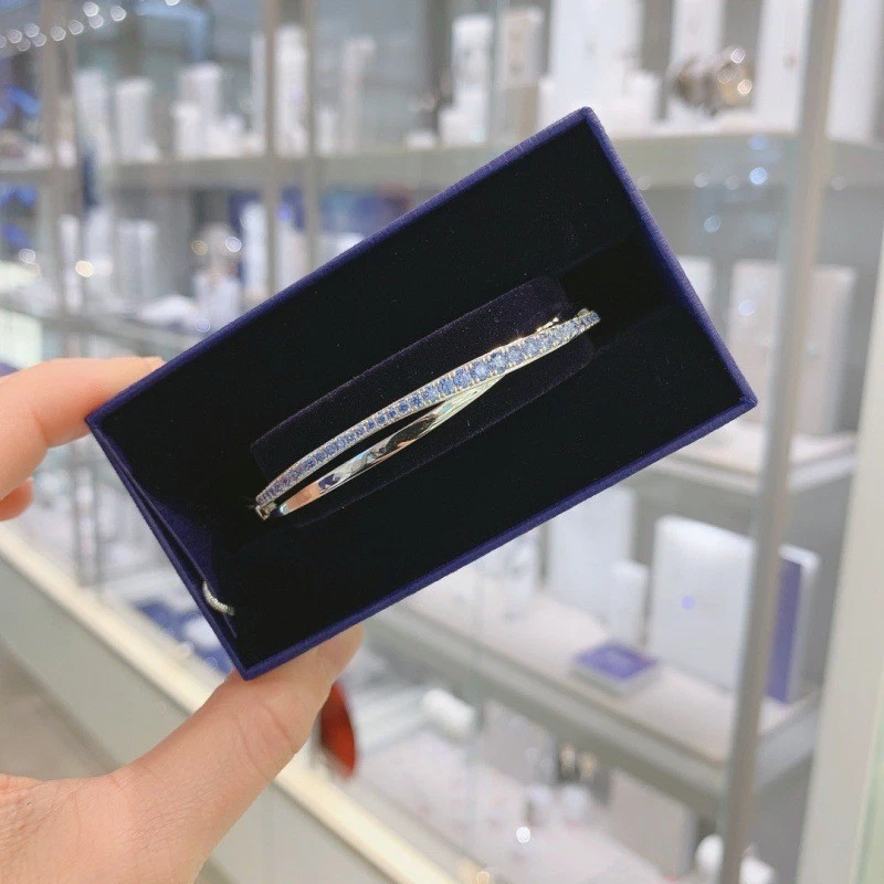 Pulsera Swarovski simple cruz espiral trenzada curva cuerda pulsera escalonada Foto 3 de 4