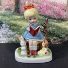 Vintage Porcelain Easter Figurine Girl Reading to Her Bunny & Doll