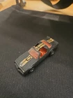 vintage 1977 Hot Wheels Hot Bird toy car in black with gold