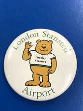 Large 45mm button badge London Stansted Airport Plastic back Good Condition Used
