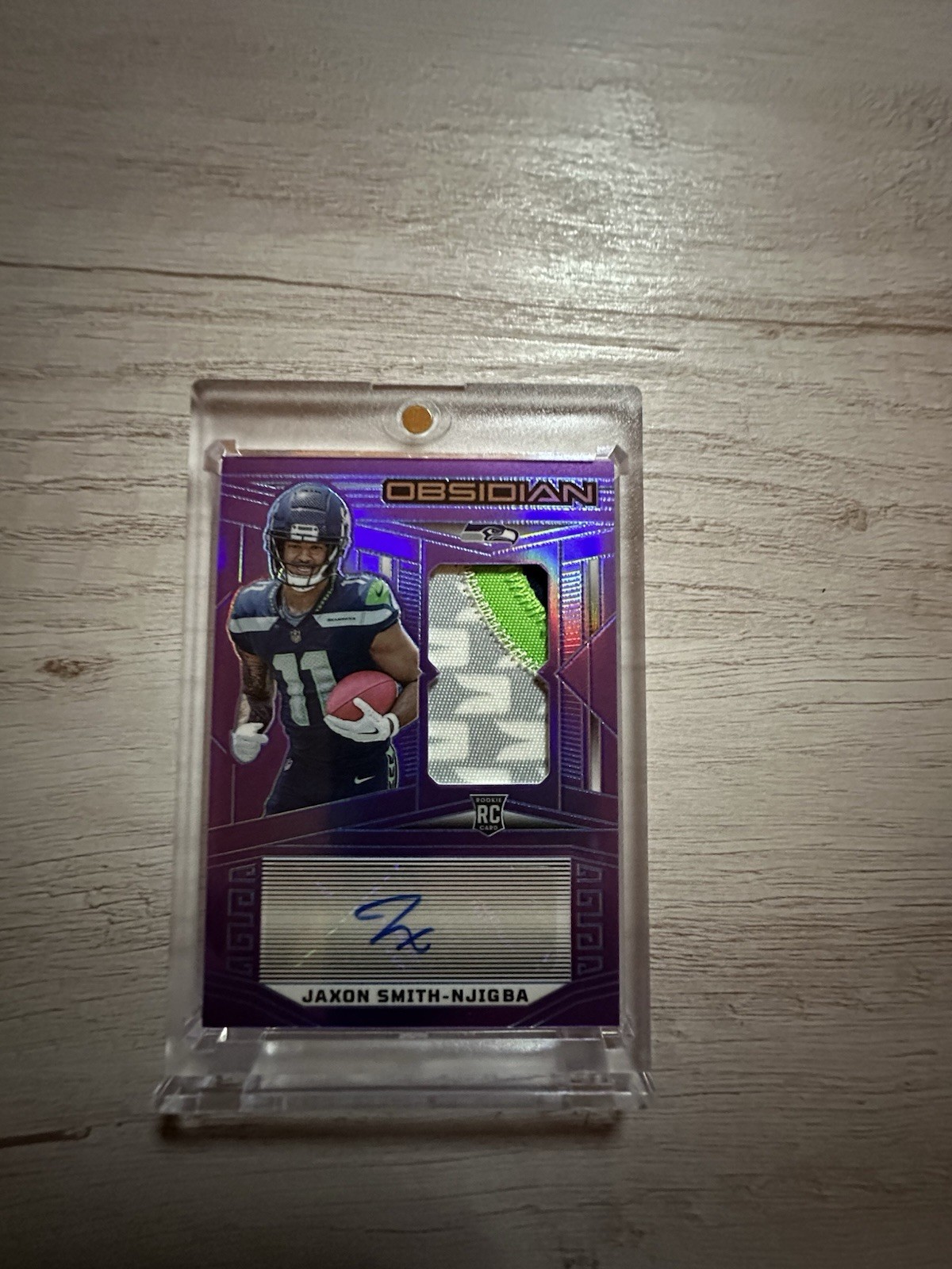 Jaxon Smith-Njigba 2023 Obsidian Rookie Patch Auto Purple Flood FOTL /30 RPA