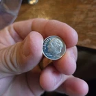 1964 and 2006S Rosevelt dimes. Both 90% silver and absolutely BU