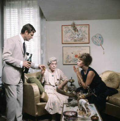 Marcello Mastroianni offering a drink to Italian actresses Tina Pi- Old Photo