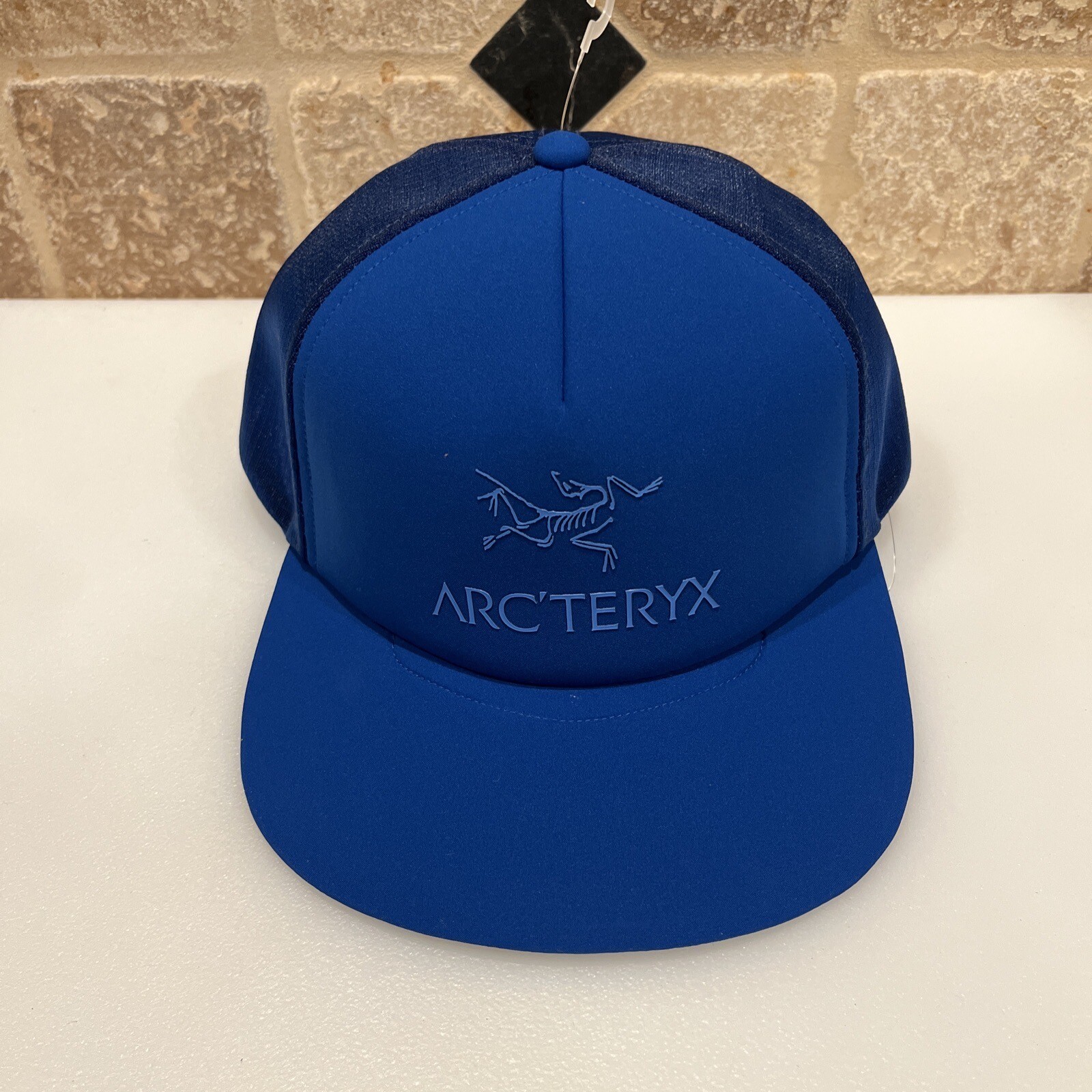 Cappello piatto con logo camionista Arc'teryx cappello a scatto uccellino blu vitalità nuovo con etichette nuovo