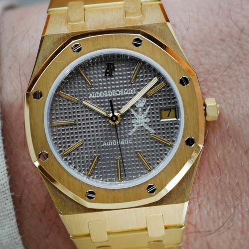 Audemars Piguet Yellow Gold Royal Oak Watch Ref. 4100 with Khanjar Emblem of Oma