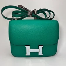 HERMÈS Constance leather handbag green 