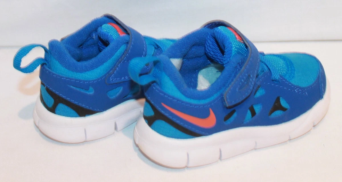 Baby blue best sale nike free runs