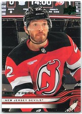 2025-26 Upper Deck Series 1 Holiday SP Green Foil #105 Brett Pesce New Jersey