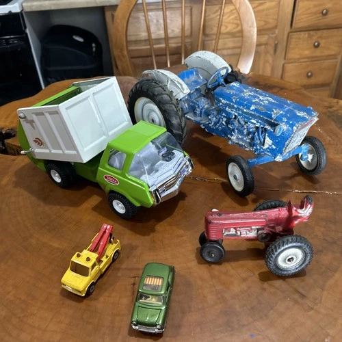 Vintage Diecast Vehicles Lot of 5 Small & Large-Ford Tractor, Tonka Dump truck .