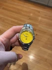 Fossil Blue Silver Wristwatch Yellow Dial Metal Band 100 Meters Analog Display