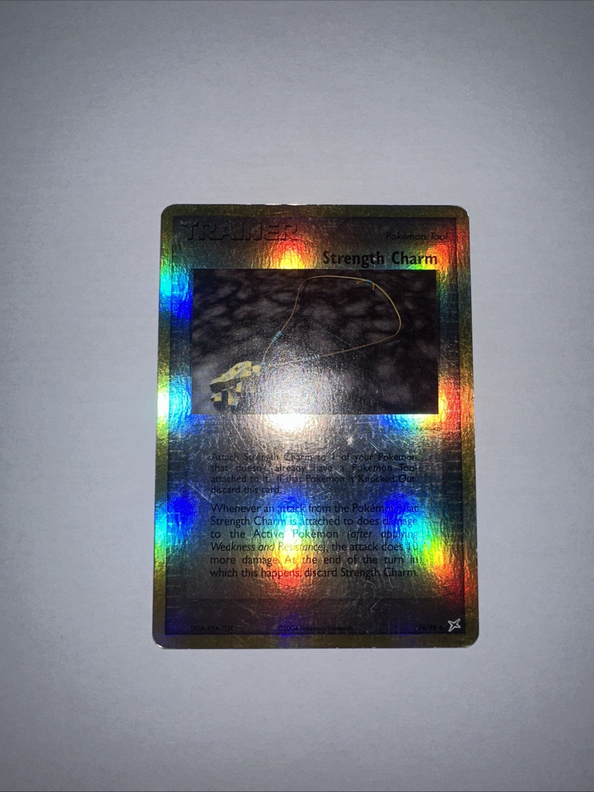 Strength Charm 74/95 Team Magma vs Team Aqua Reverse Holo