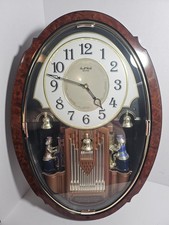 Rhythm Small World Liberty Musical Wall Clock with Roman Numerals