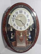 Rhythm Small World Woodgrain Moving Wall Clock 4MH752 Works Multiple Melodies
