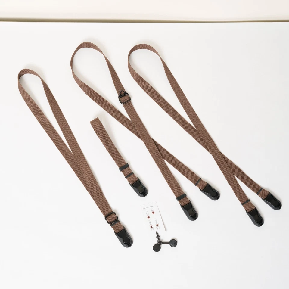 Correa de cámara marrón con anclajes de diseño de pico / muñeca y cuello DSLR película sin espejo Foto 4 de 4