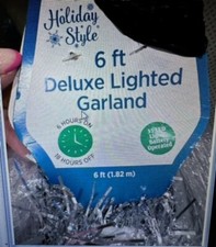 Holiday Style 6 ft Deluxe Light Silver Tinsel Garland 6 hr on Floats Battery Opt