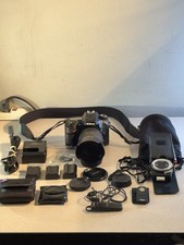 Nikon D7100 DSLR Camera Nikkor DX 18 -135mm Lens 3 Batteries Charger Bundle