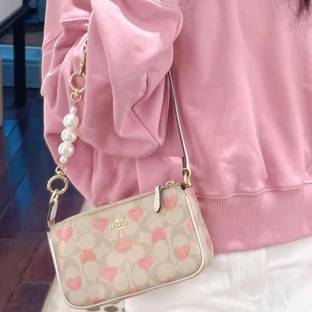 Tela firmata Coach Nolita 19 con etichette con stampa cuore CQ144 + catena gratuita