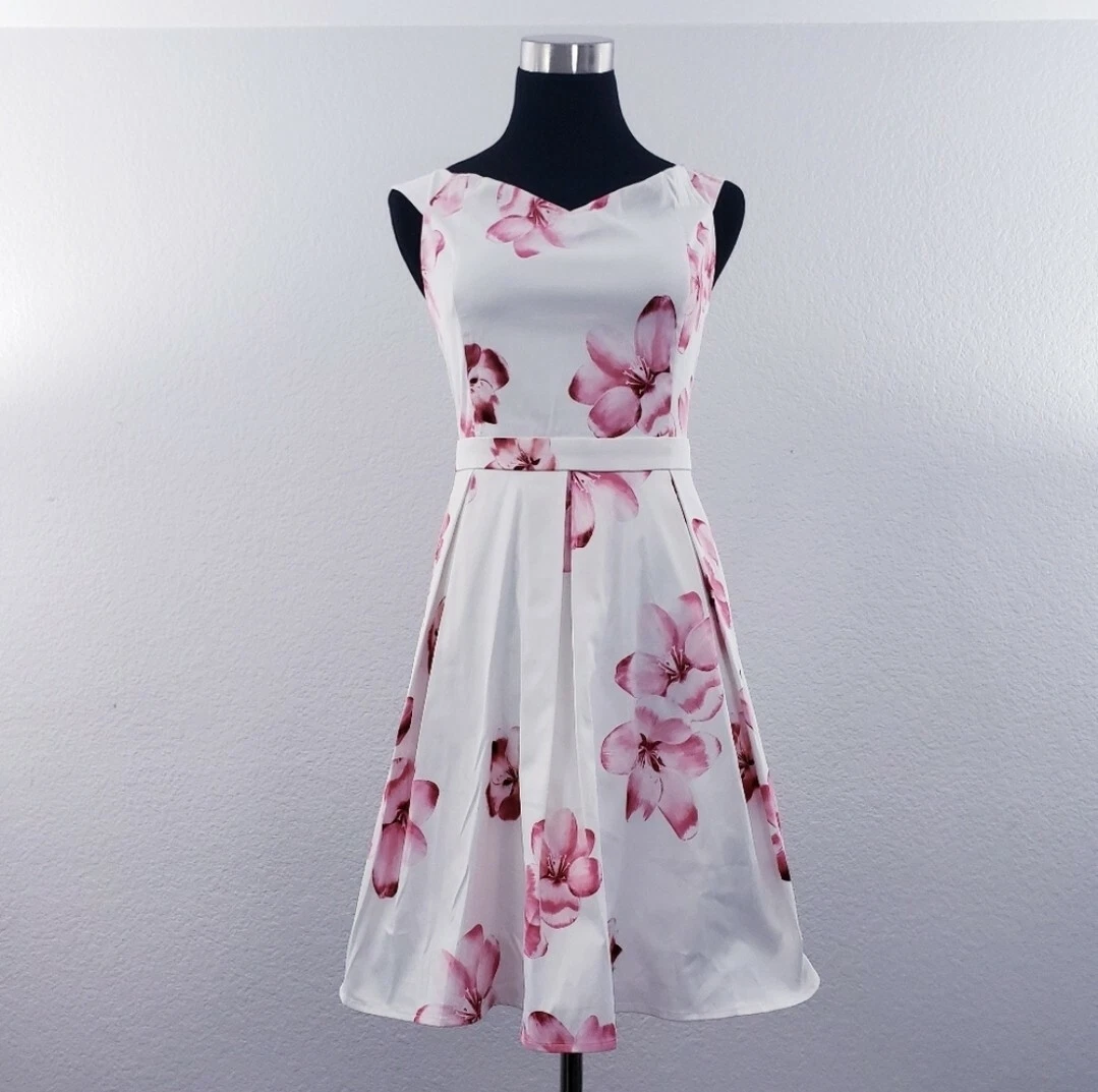 White fit and top flare dress knee length