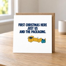 Funny First Christmas in Our New Home Card - Just Us And The Packaging.